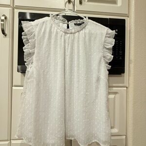 A …Love Story 
 White Ruffle Blouse